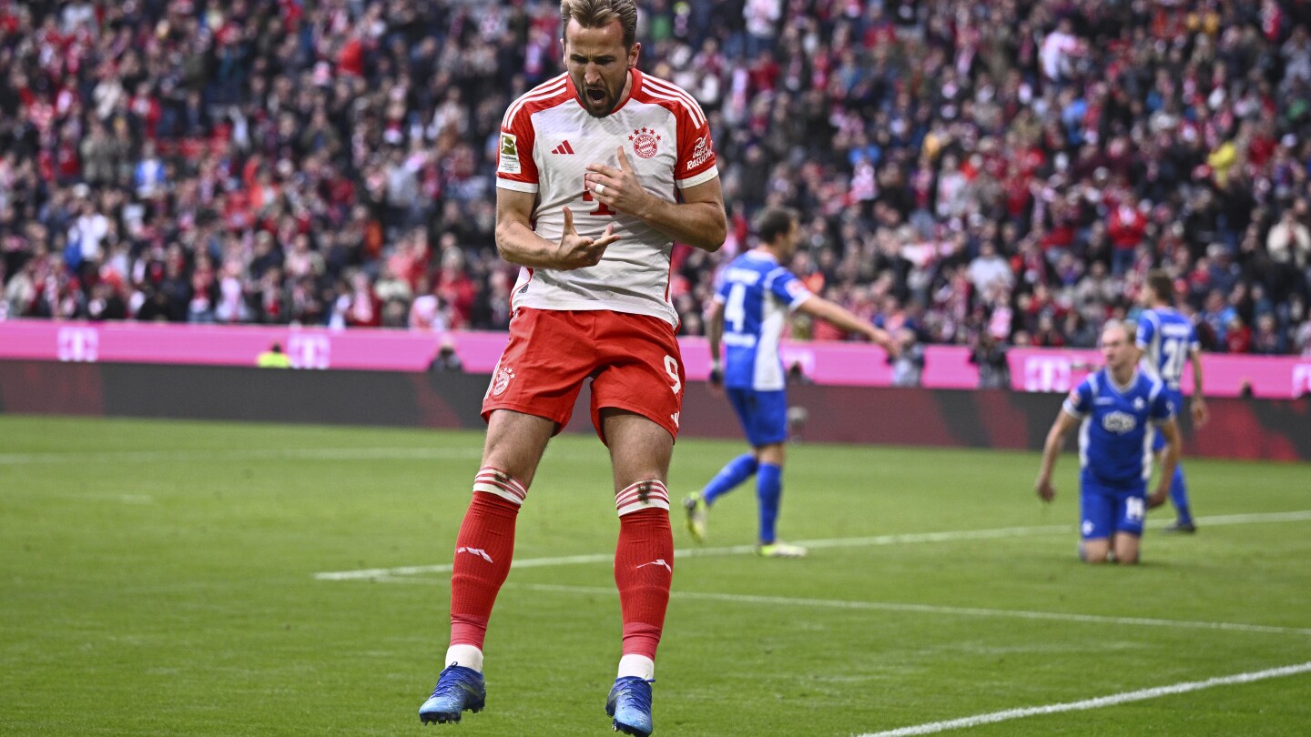 Le Bayern marque 8 buts en 2ème mi-temps contre Darmstadt.  Kane frappe depuis sa moitié de terrain et Neuer revient