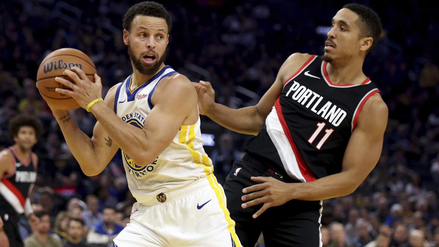 Stephen Curry marque 31 points, les Warriors se rassemblent pour battre les Trail Blazers 110-106