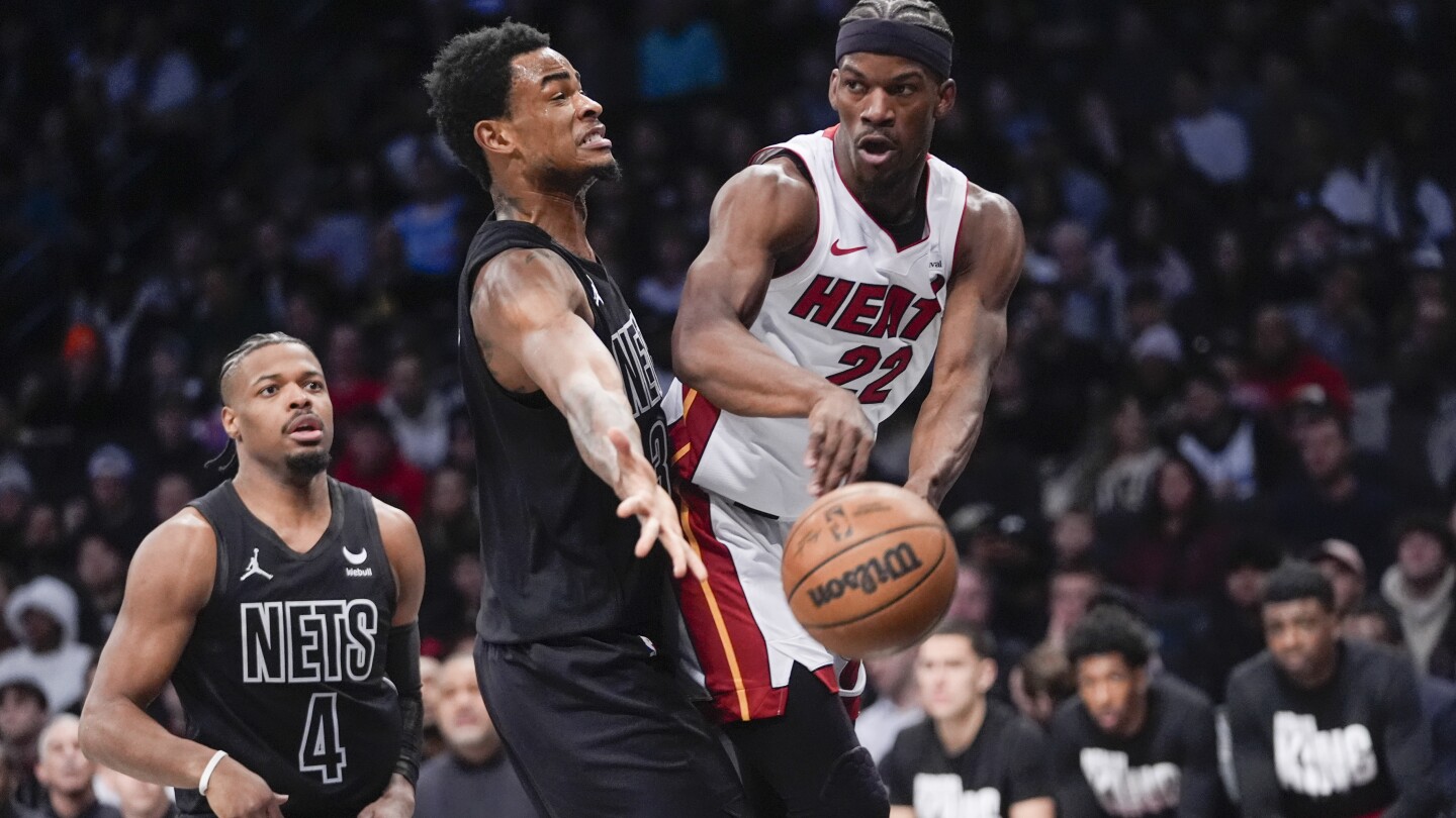 Butler marque 31 points en retour, dont deux lancers francs tardifs en prolongation alors que Heat bat les Nets 96-95