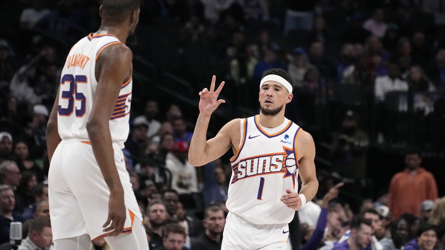 Devin Booker marque 46 points alors que les Suns battent les Mavs 132-109 pour une 7e victoire consécutive